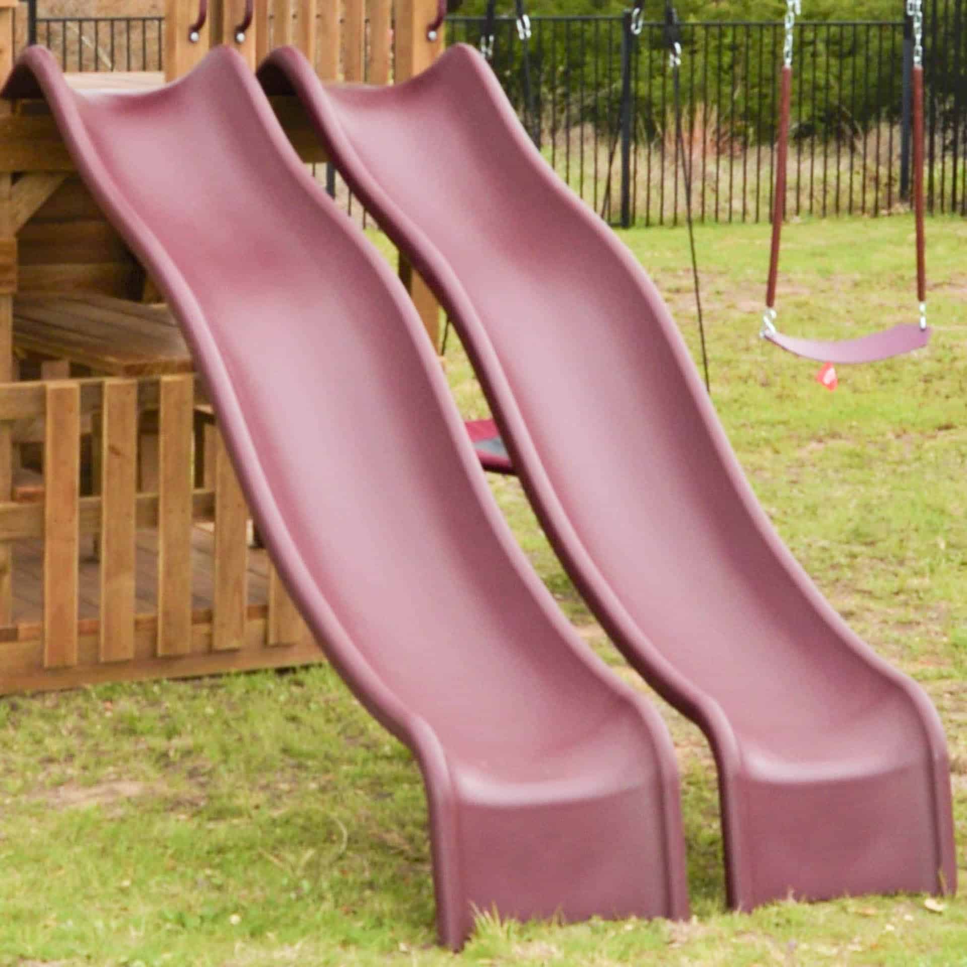 Speedwave wave slide on a Quality Playscapes playset