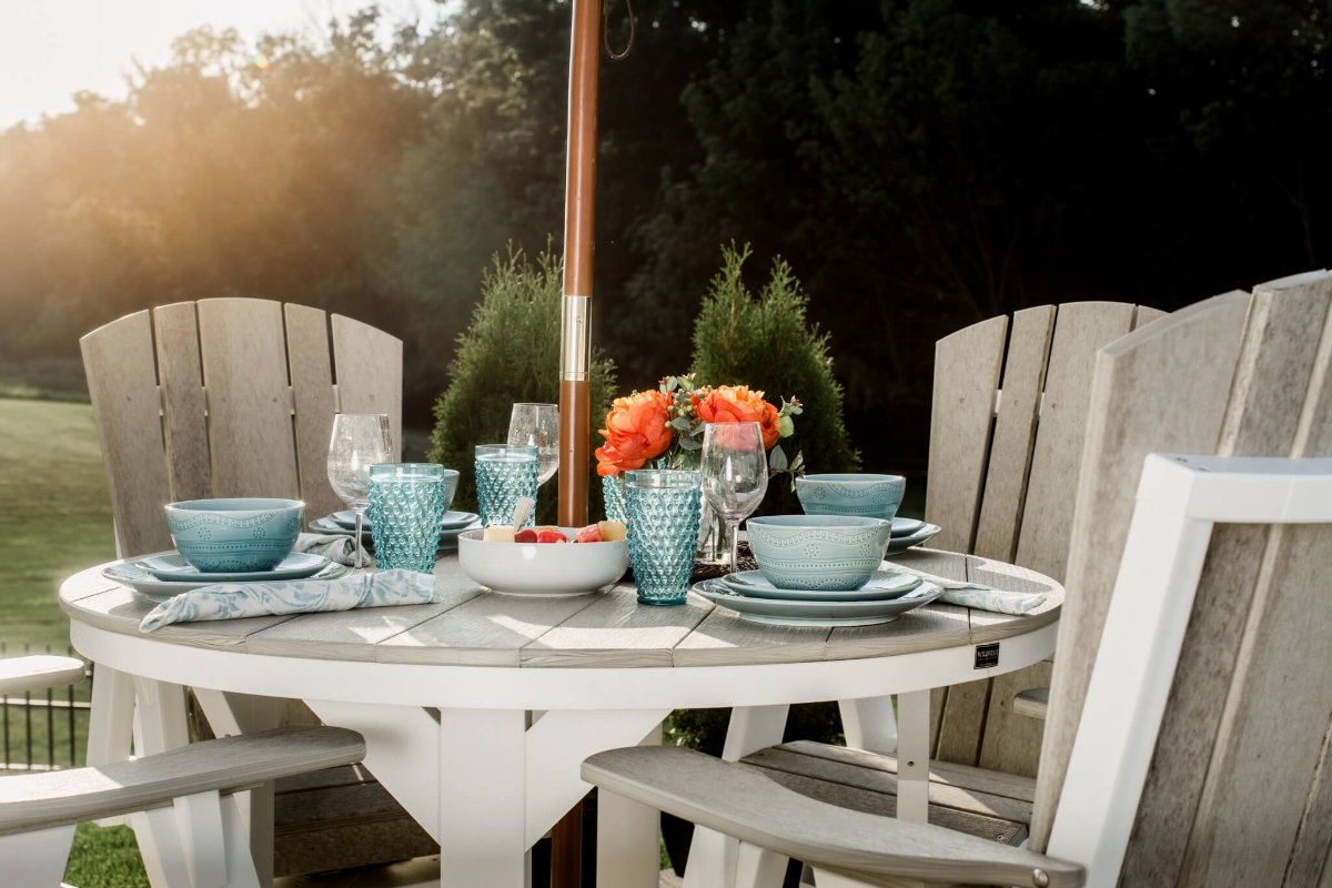 Poly outdoor dining set at sunset