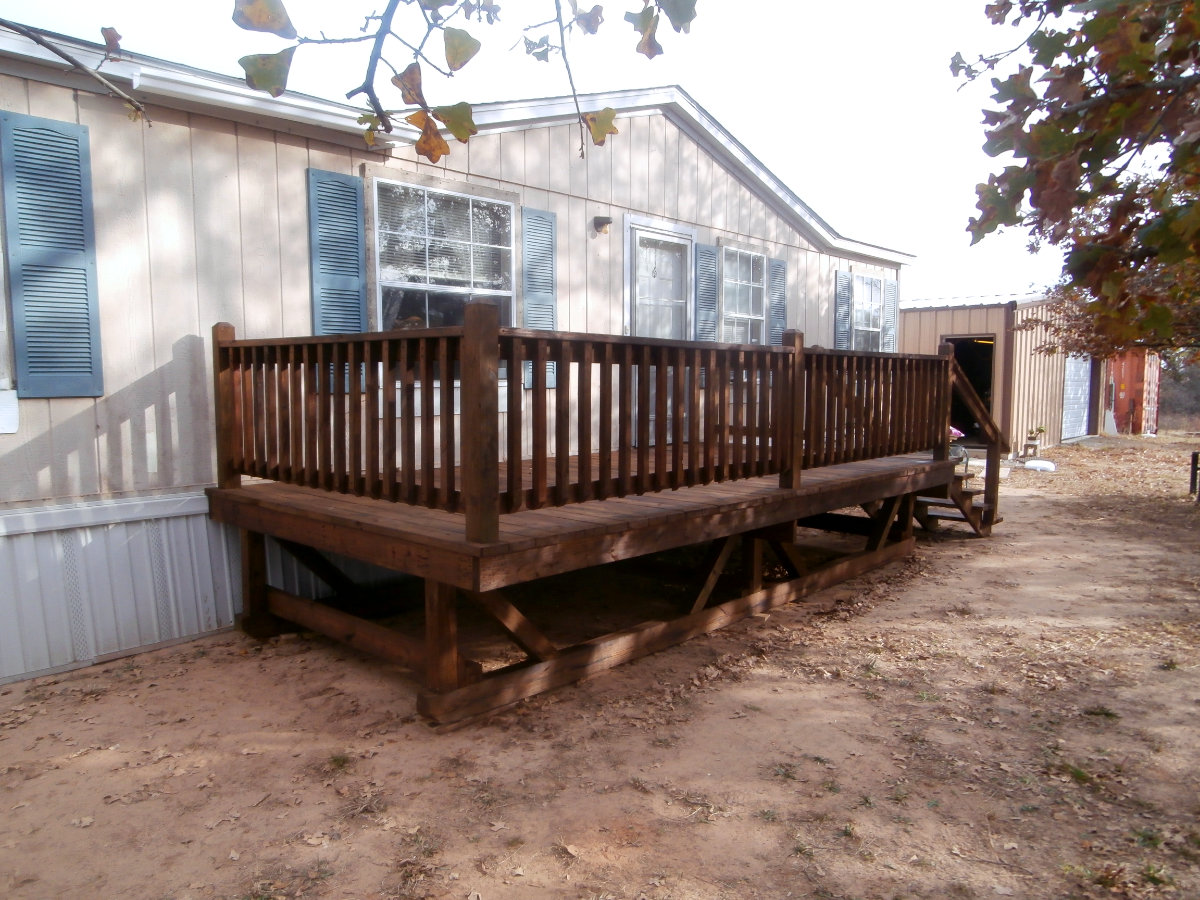 Dark-stained open portable deck with stairs