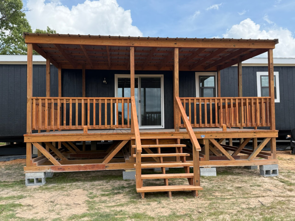 Covered wood portable deck with front steps