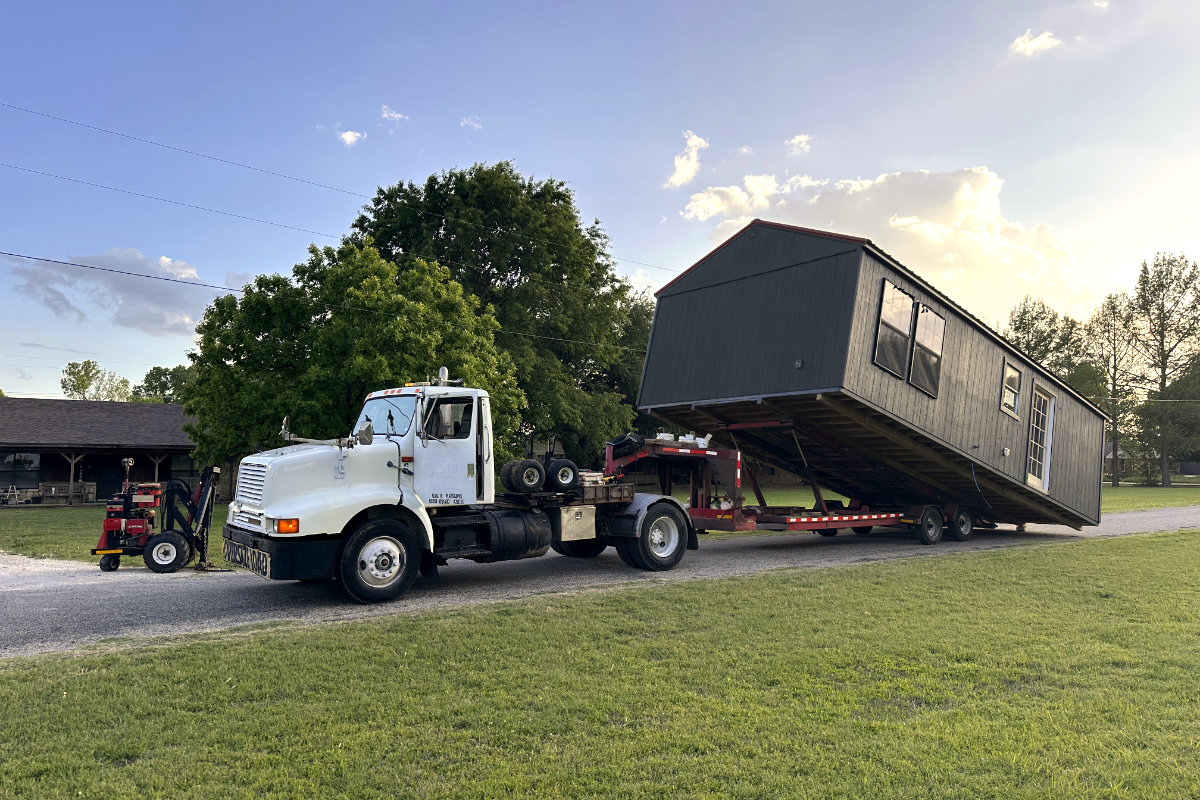 Portable building being relocated